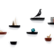 Illustration for article titled Corniche Shelves Are Slices of Nature to Hang Your Stuff From